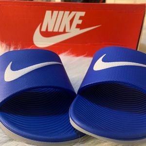 Blue Nike slides